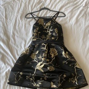 Black and gold lulus dress. New with tags!!
